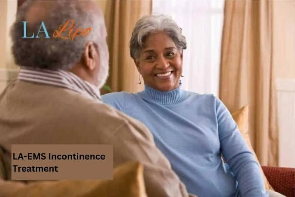 Couple sat smiling at each other - LA-EMS treatment Stratford