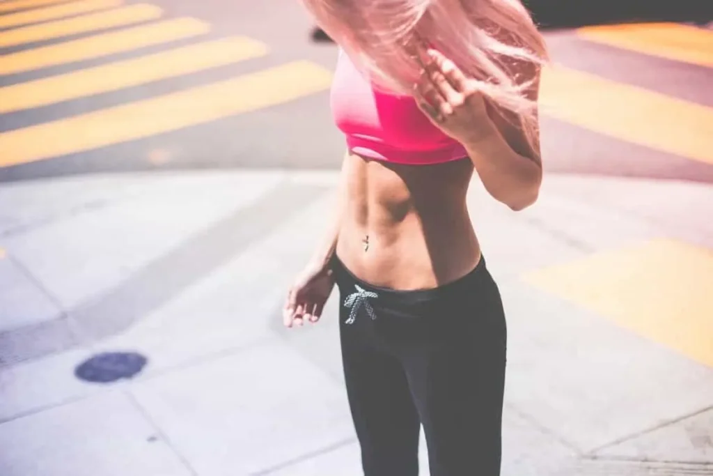 Woman with toned stomach after LA-EMS Body Sculpting Treatment Stratford